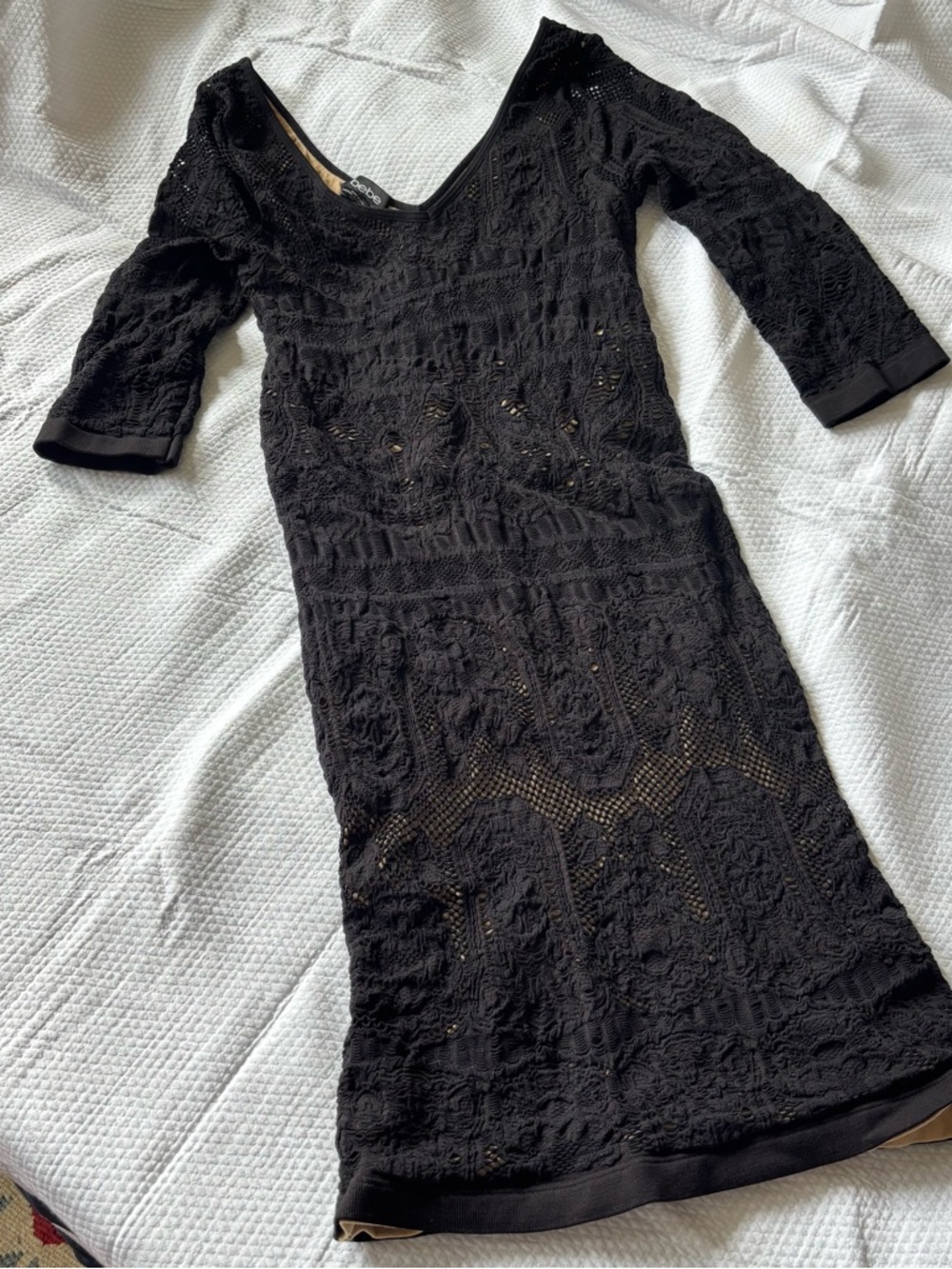 Bebe BodyCon sheer Lace Dress
Black with lining
XS
